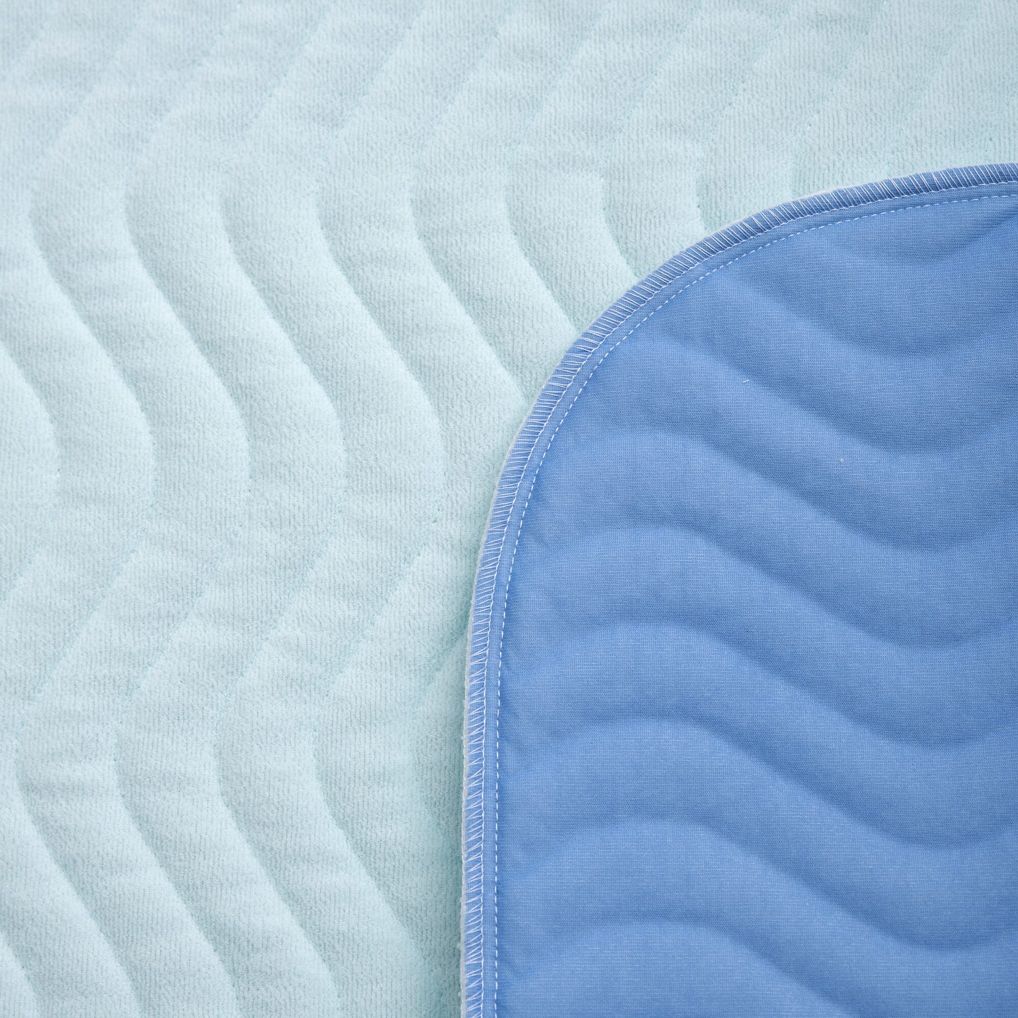 Lifestyle image of Abso Eco Bedpad-5 Layer being used in a real-life setting.