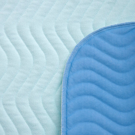 Lifestyle image of Abso Eco Bedpad-5 Layer being used in a real-life setting.