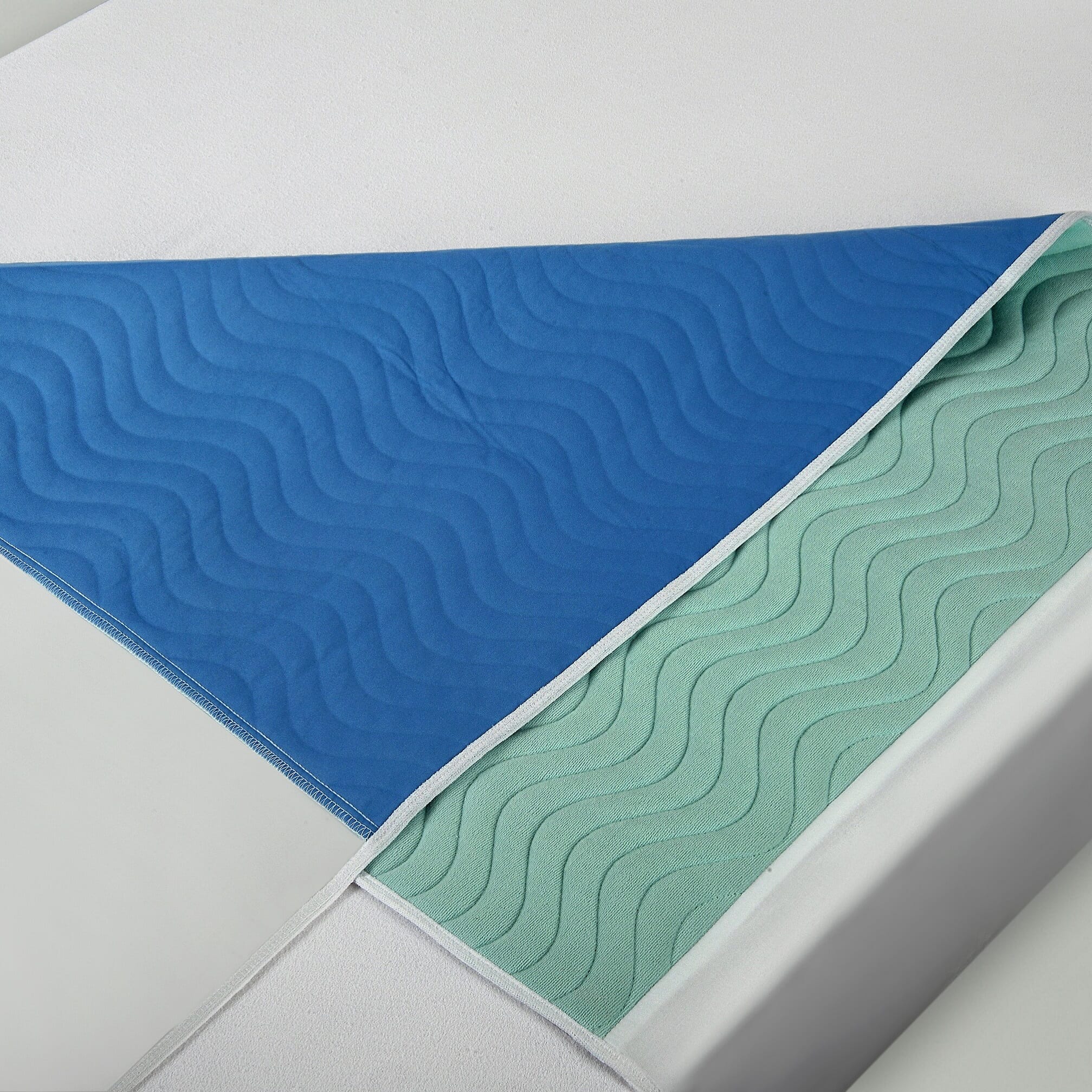 Lifestyle image of Abso Eco Bedpad-5 Layer being used in a real-life setting.