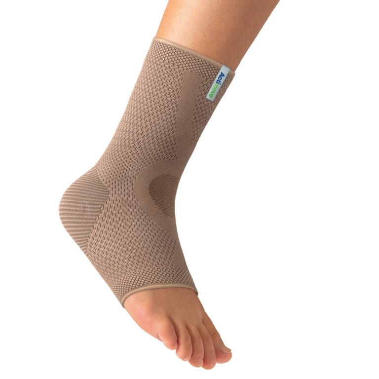 Actimove Ankle Support being worn by a model on the relevant joint, demonstrating fit and coverage.