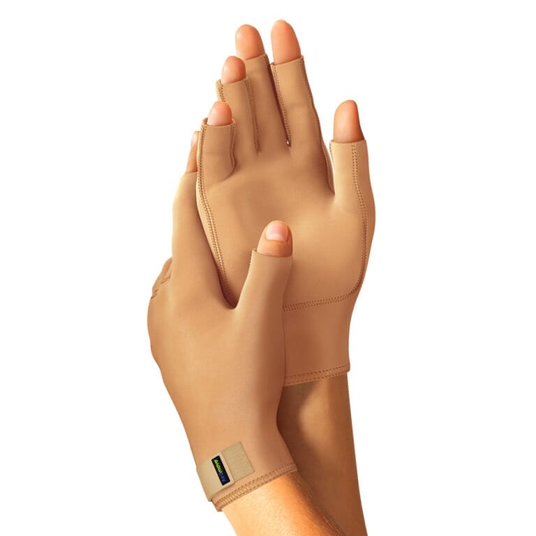 Actimove Arthritis Gloves gloves being worn, showing how they fit snugly on the hands and allow finger movement.