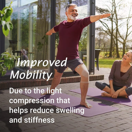 Actimove Arthritis Knee Support support being applied or removed from the joint, illustrating ease of use.