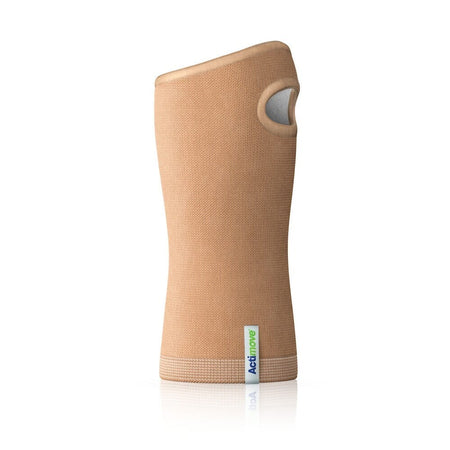 Actimove Arthritis Wrist Support being worn by a model on the relevant joint, demonstrating fit and coverage.