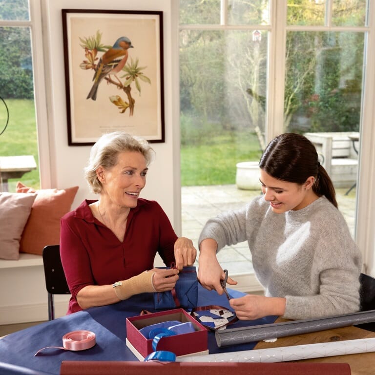 Close-up of the adjustable strap or fastening on Actimove Arthritis Wrist Support support, showing how it secures in place.