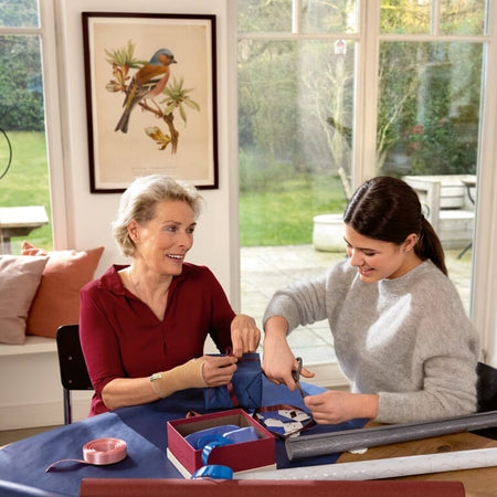 Close-up of the adjustable strap or fastening on Actimove Arthritis Wrist Support support, showing how it secures in place.