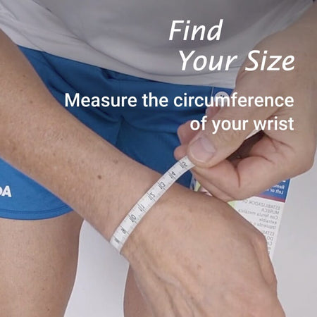 Actimove Arthritis Wrist Support support being applied or removed from the joint, illustrating ease of use.