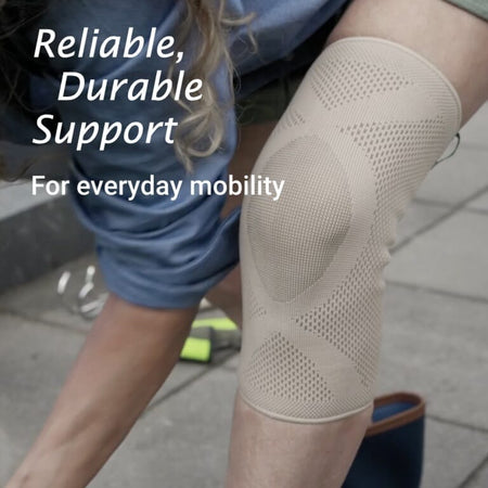 Close-up of the adjustable strap or fastening on Actimove Knee Support support, showing how it secures in place.