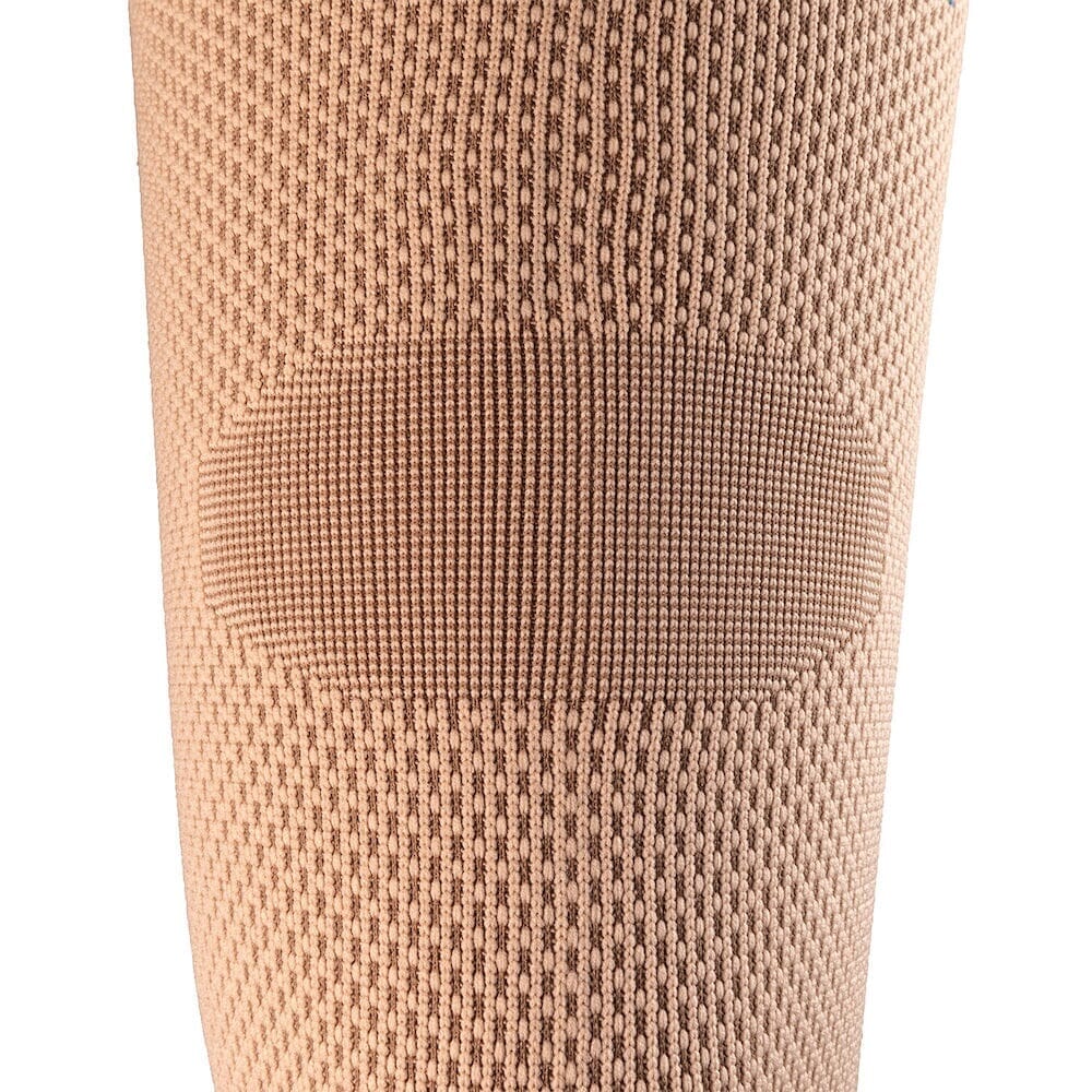 Actimove Knee Support with Two Stays being worn by a model on the relevant joint, demonstrating fit and coverage.