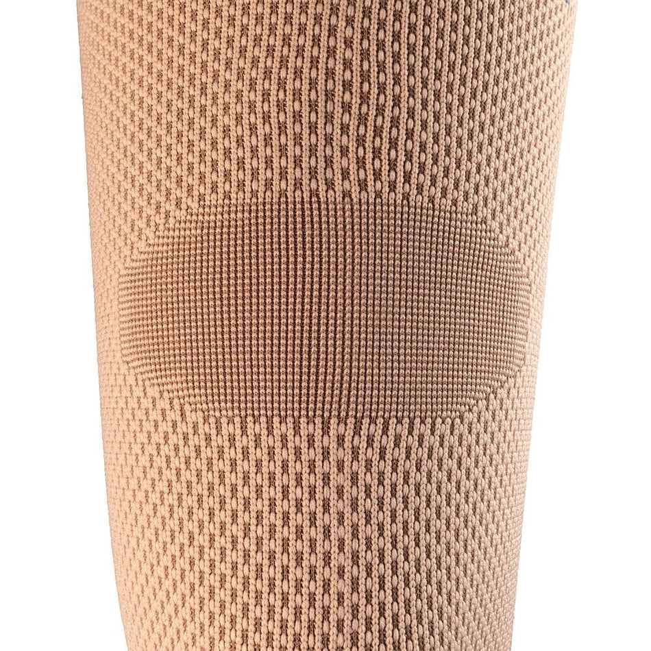 Actimove Knee Support with Two Stays being worn by a model on the relevant joint, demonstrating fit and coverage.