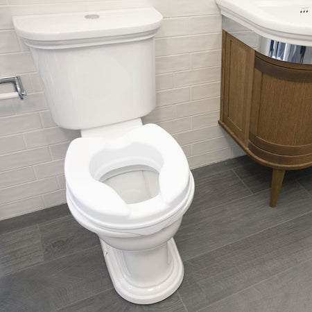 Alternative view of Ashby Easyfit Raised Toilet Seat, showing different angle or usage.