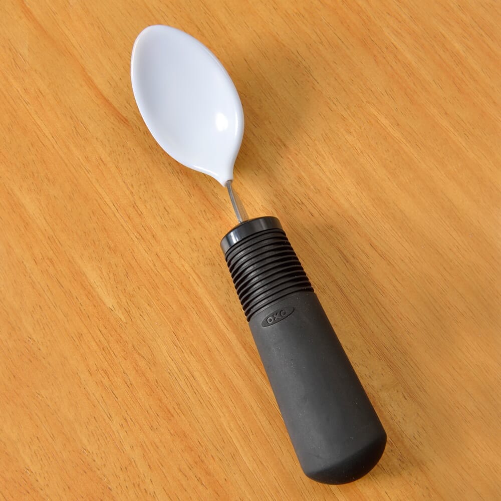Lifestyle image of BIG-GRIP Coated Teaspoon being used in a real-life setting.