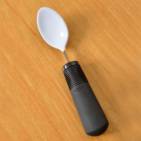 Lifestyle image of BIG-GRIP Coated Teaspoon being used in a real-life setting.