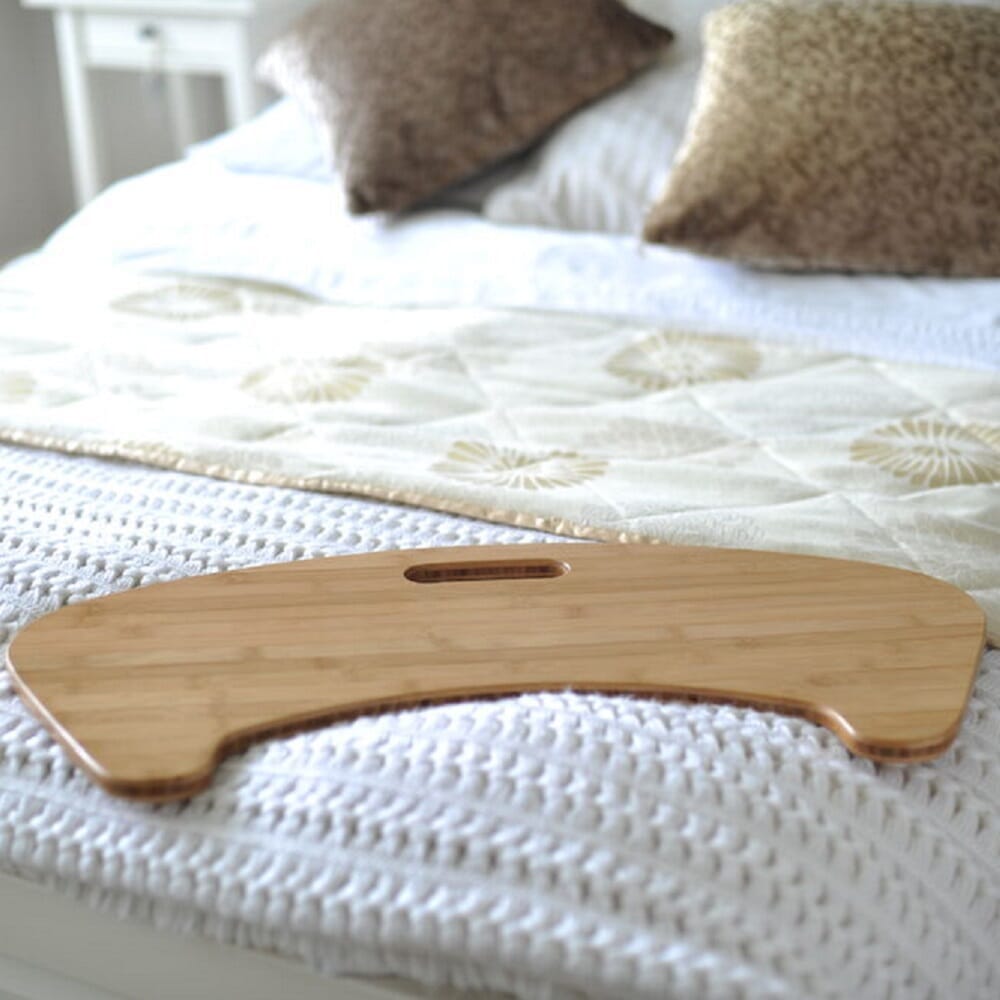 Full view of Bamboo Curved Transfer Board mobile hoist on a plain background, showing the wheeled base, upright mast and sling attachment.