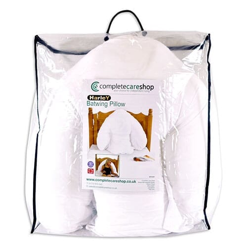 Batwing Pillow cushion on a seat or chair, demonstrating added comfort and pressure relief.