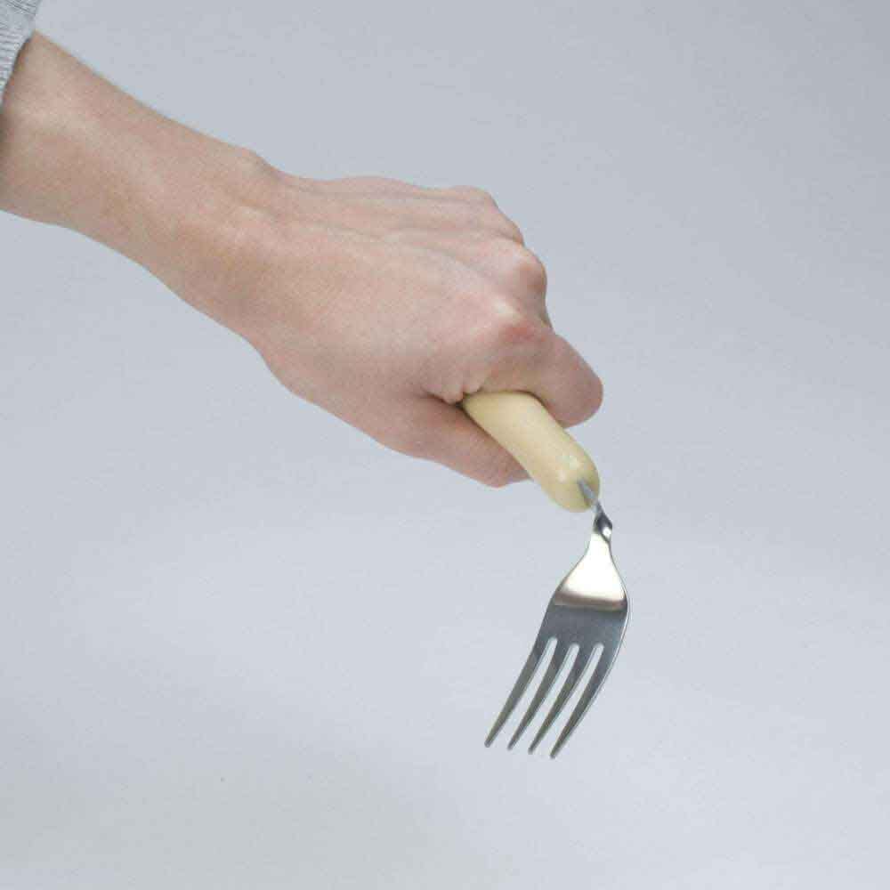 Alternative view of Caring Cutlery Fork, showing different angle or usage.