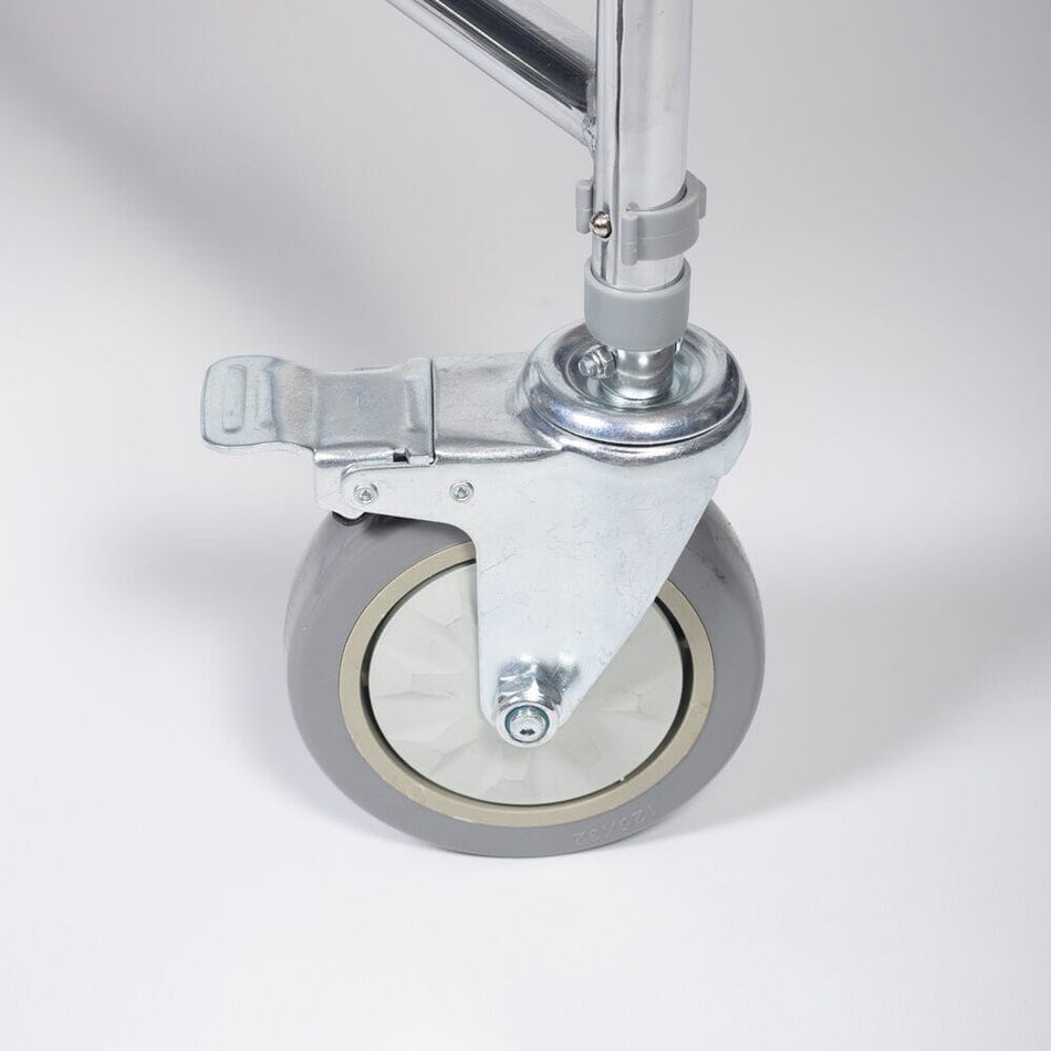 Castor for Mobile Commode with lid raised showing the open seat and removable commode pan, with supportive arms and adjustable height on a plain background.