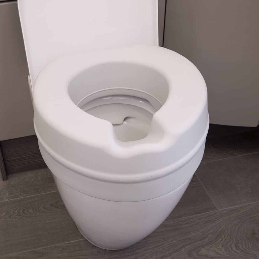Image of Comfort Padded Raised Toilet Seat on a plain background.