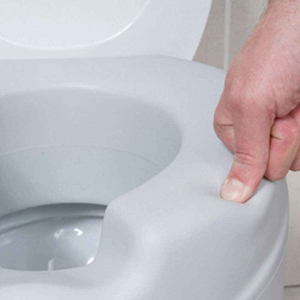 Lifestyle image of Comfort Padded Raised Toilet Seat being used in a real-life setting.