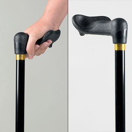 Comfy Grip Walking Stick walking stick in use by a person, demonstrating balance and support.