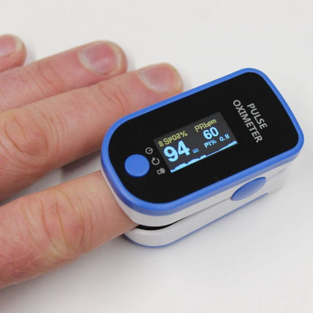 Lifestyle image of Digital Fingertip Pulse Oximeter being used in a real-life setting.