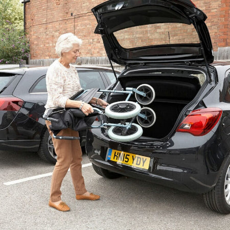 Diagram or packaging of Escape Lite Manual Wheelchair highlighting dimensions or features.