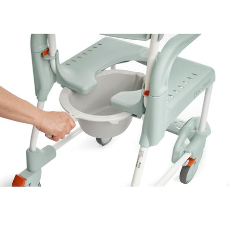 Etac Clean Commode Pan with lid closed, highlighting the padded seat and discreet design.