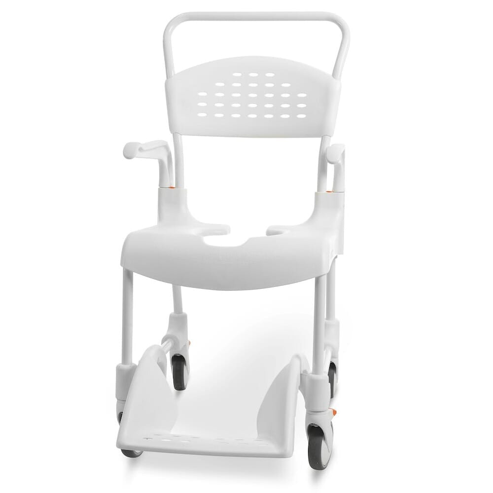 Etac Clean Shower Commode Chair with lid closed, highlighting the padded seat and discreet design.