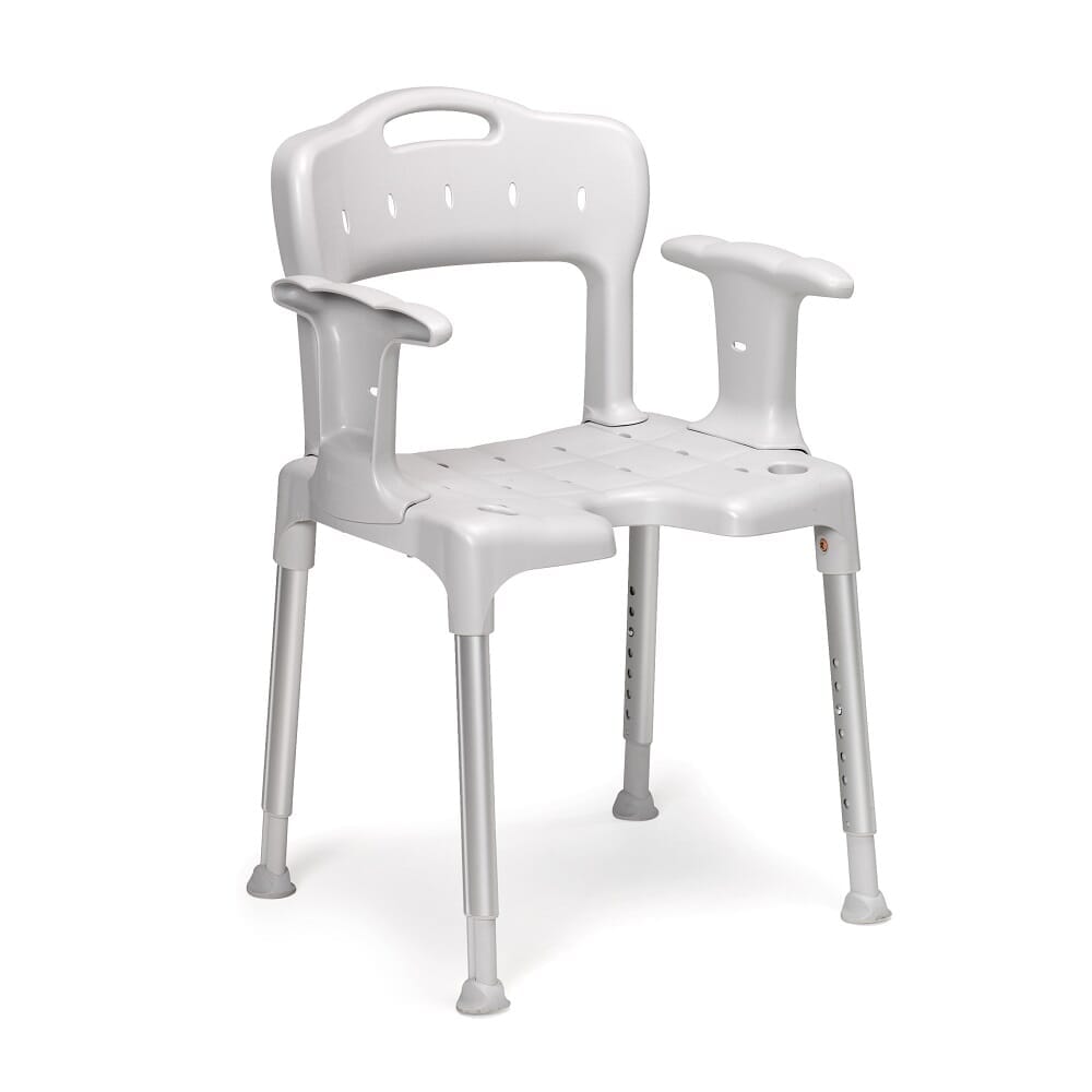 Angled view of Etac Swift Shower Chair with moulded seat, supportive backrest and height-adjustable legs on a plain background.