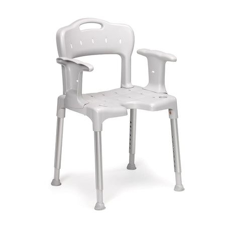 Angled view of Etac Swift Shower Chair with moulded seat, supportive backrest and height-adjustable legs on a plain background.