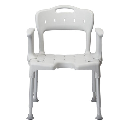 Angled view of Etac Swift Shower Chair with moulded seat, supportive backrest and height-adjustable legs on a plain background.