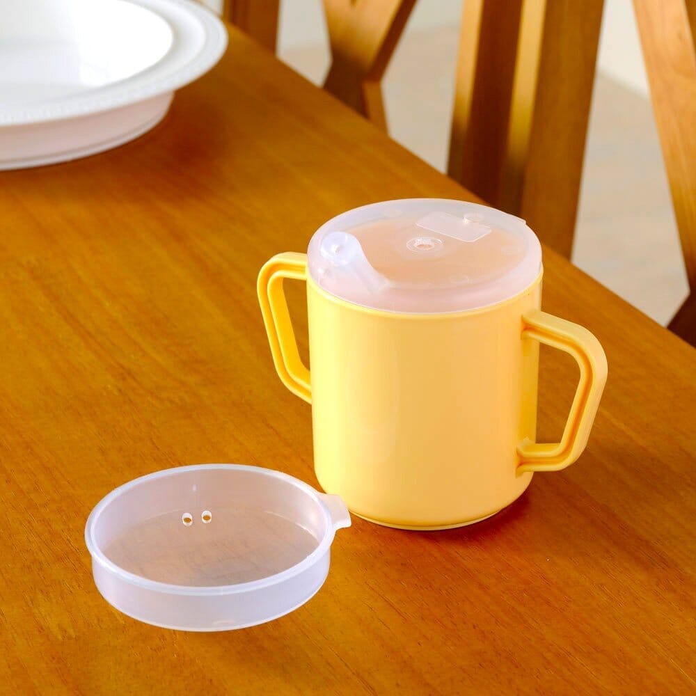 Alternative view of Feeding Mug with Narrow Spout and Feeder Lid, showing different angle or usage.