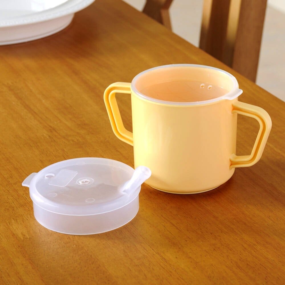 Close-up of a feature of Feeding Mug with Narrow Spout and Feeder Lid.