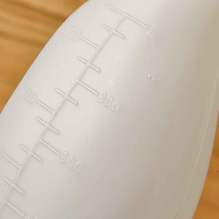 Image of Female Urinal on a plain background.