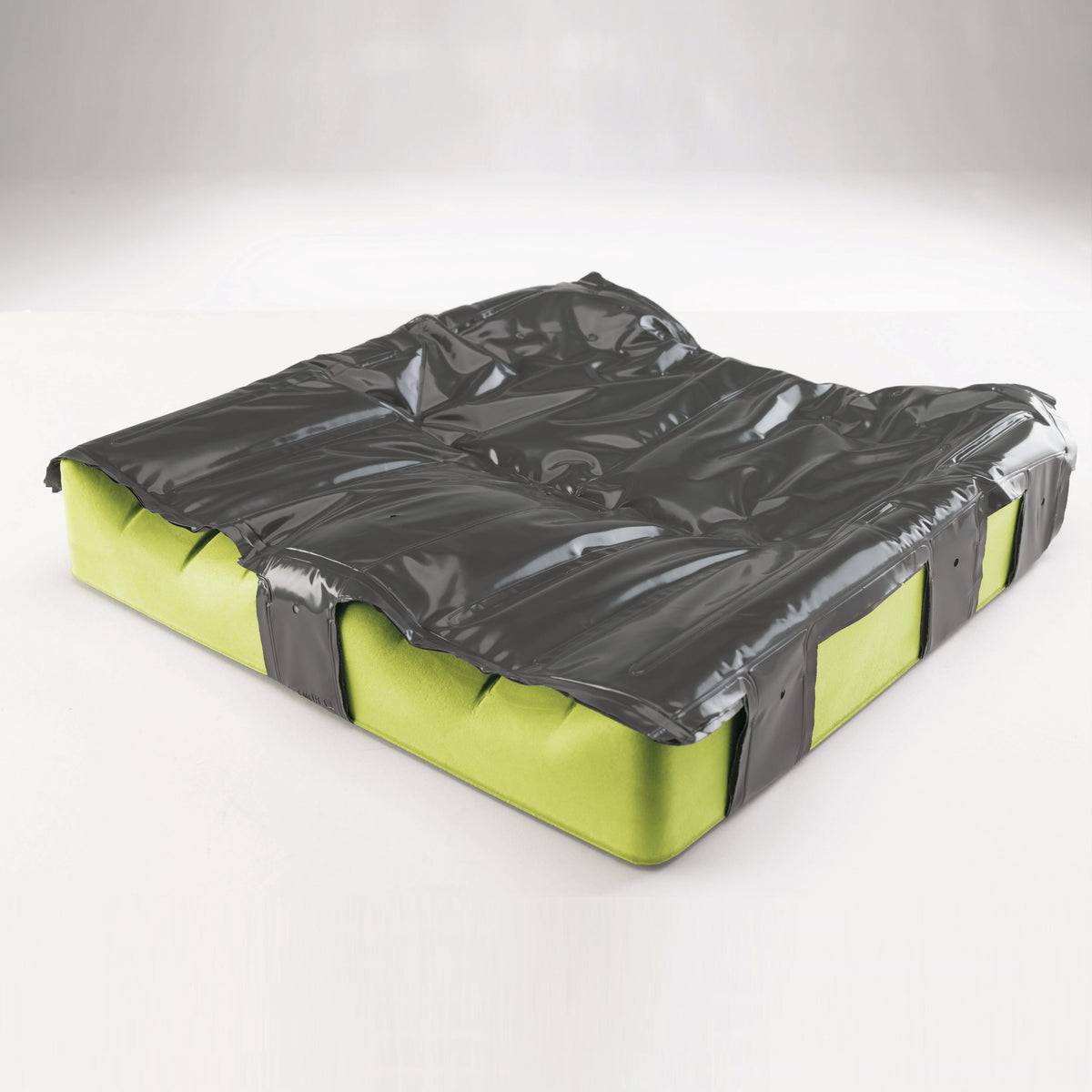 Full view of Flo-Tech Solution Cushion cushion on a plain background, showing its shape and supportive material.