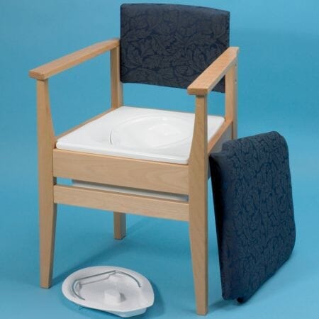 Gordon Ellis Deluxe Commode Chair with lid raised showing the open seat and removable commode pan, with supportive arms and adjustable height on a plain background.