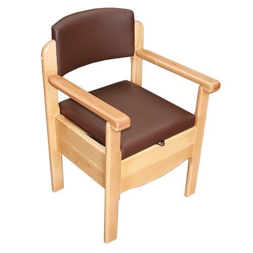 Gordon Ellis Royale Commode with lid closed, highlighting the padded seat and discreet design.