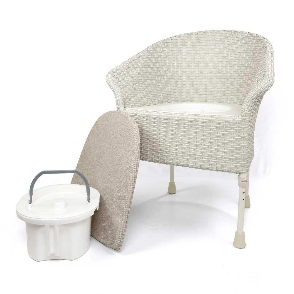 Gordon Ellis Walton Height Adjustable Commode positioned in a home environment such as a bedroom or bathroom, demonstrating its discreet appearance.