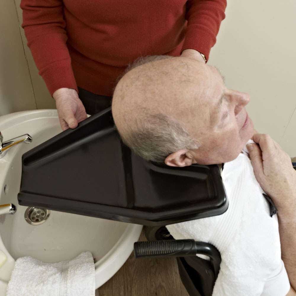 Hair Washing Tray tray in use, carrying drinks, plates or other household items.