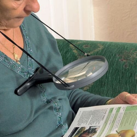 Image of Hands-Free Magnifying Glass with Light on a plain background.