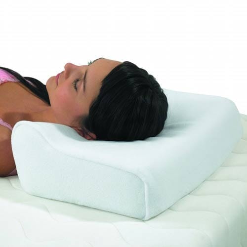 Harley Designer Orthopaedic Pillow cushion on a seat or chair, demonstrating added comfort and pressure relief.