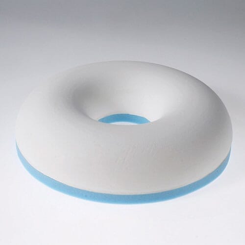 Full view of Harley Designer Ring Cushion cushion on a plain background, showing its shape and supportive material.