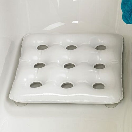Full view of Inflatable Bath Cushion cushion on a plain background, showing its shape and supportive material.