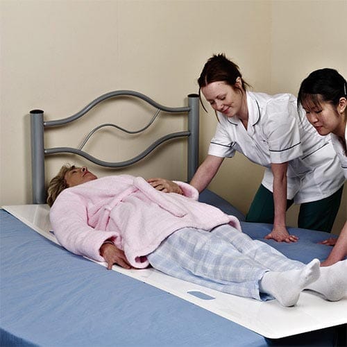 Full view of Lateral Transfer Slide Board mobile hoist on a plain background, showing the wheeled base, upright mast and sling attachment.