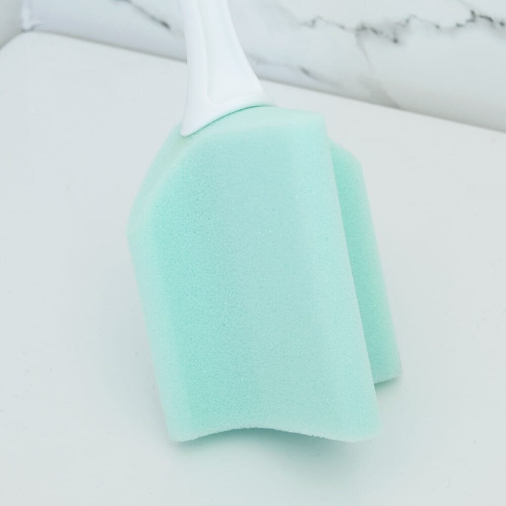 Close-up of a feature of Long Handled Sponge Toe Washer.