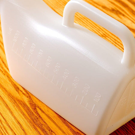 Close-up of a feature of Long Necked Male Urinal.