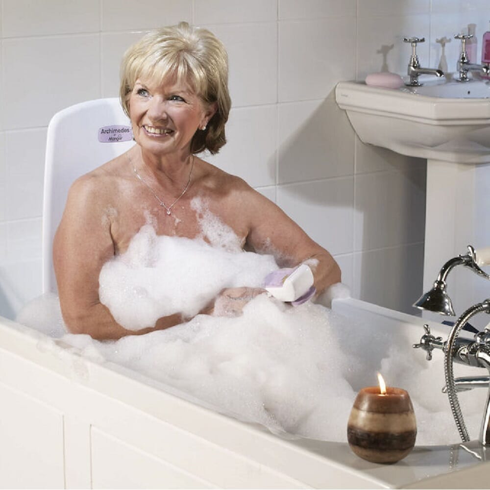 Lifestyle image of Mangar Archimedes Bath Lift being used in a real-life setting.