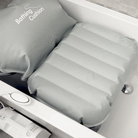 Mangar Bathing Cushion cushion on a seat or chair, demonstrating added comfort and pressure relief.
