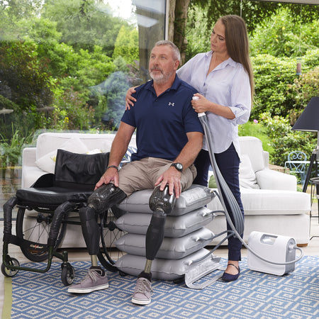 Full view of Mangar Elk Emergency Lifting Cushion cushion on a plain background, showing its shape and supportive material.