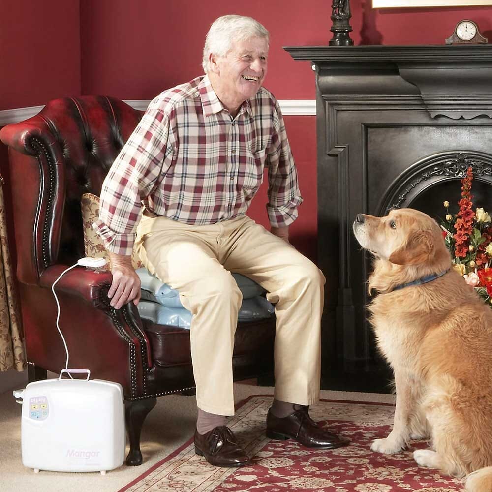 Mangar Raiser Lifting Cushion cushion on a seat or chair, demonstrating added comfort and pressure relief.