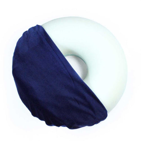 Memory Foam Ring Cushion cushion on a seat or chair, demonstrating added comfort and pressure relief.